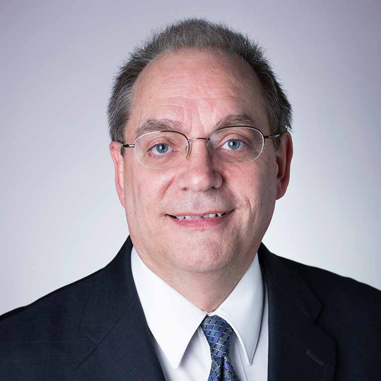 A headshot of Dave Baer.